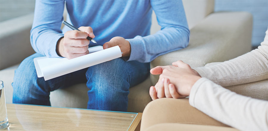 Counselling with notepad
